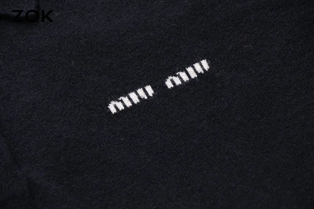 ZOK / 미우미우 폴로 스웨터