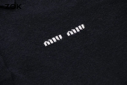 ZOK / 미우미우 폴로 스웨터